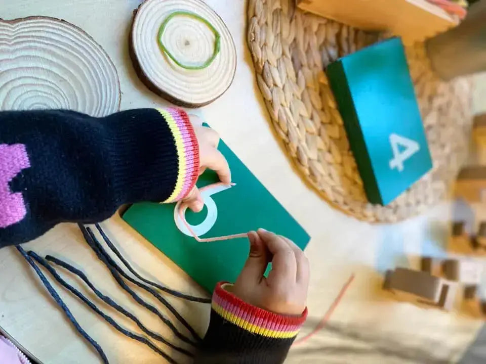 Pre-writing activity using wax sticks to build hand strength for hands-on learning activity