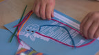 Kids crafting and playing with reusable wax sticks for creative play and reducing screen time, creating shapes and characters for screen-free fun and imaginative play