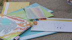 Full contents of the Crafty Curls activity kit, including 60 colorful wax sticks, activity cards, and a reusable storage case for endless creative fun