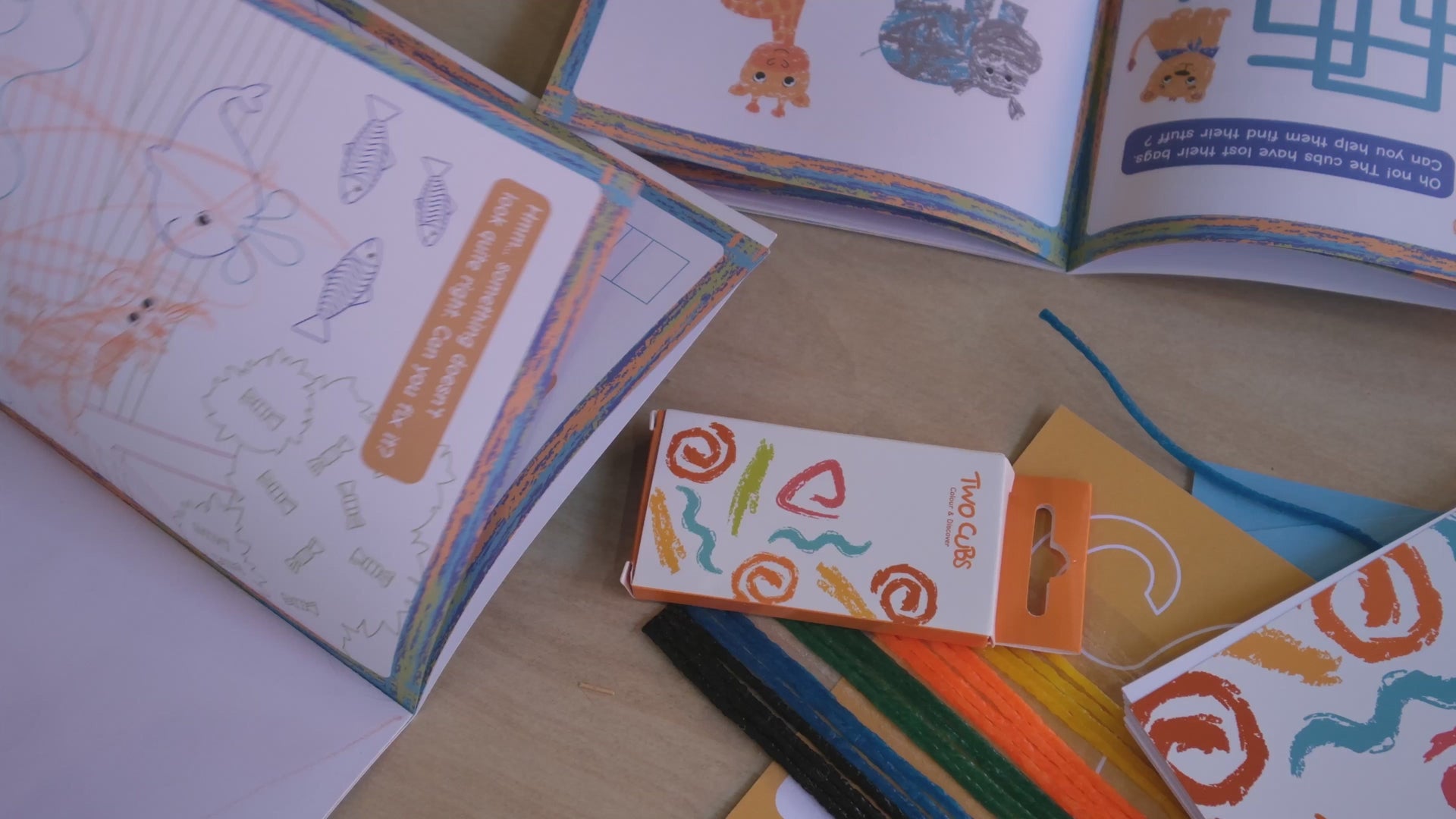 TWO CUBS Backpack comes with an activity kit, including a colouring book, crayons, and stickers, keeping kids entertained during trips