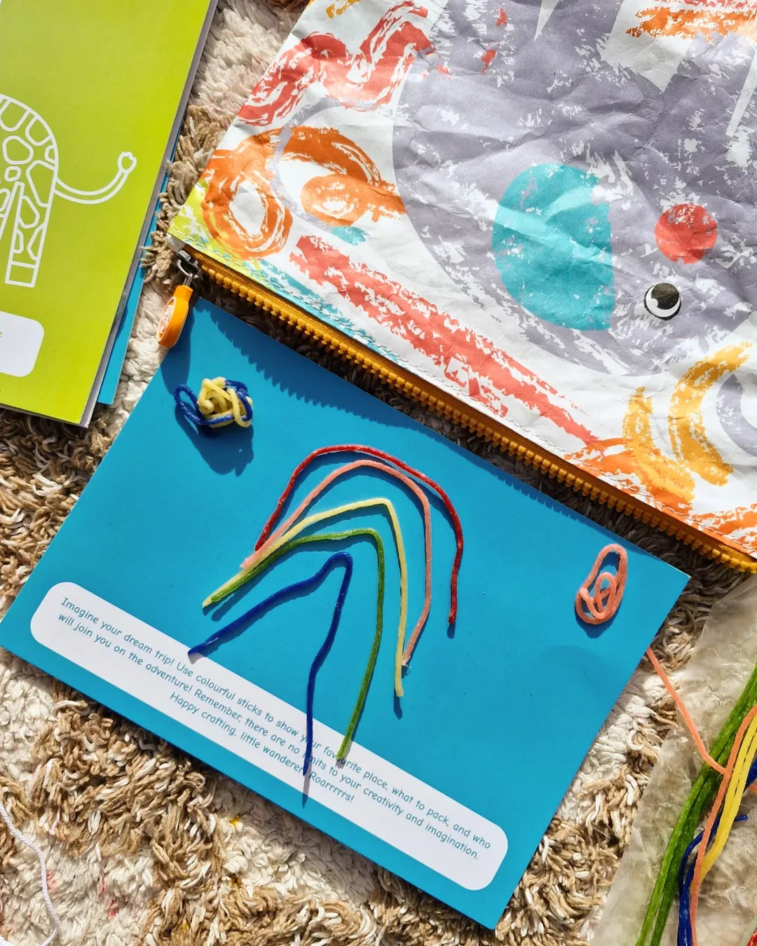 Kid playing with Twisty Kids reusable craft sticks, a quiet screen-free travel toy for creative play